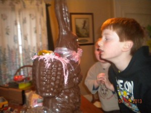 a boy and his giant chocolate bunny