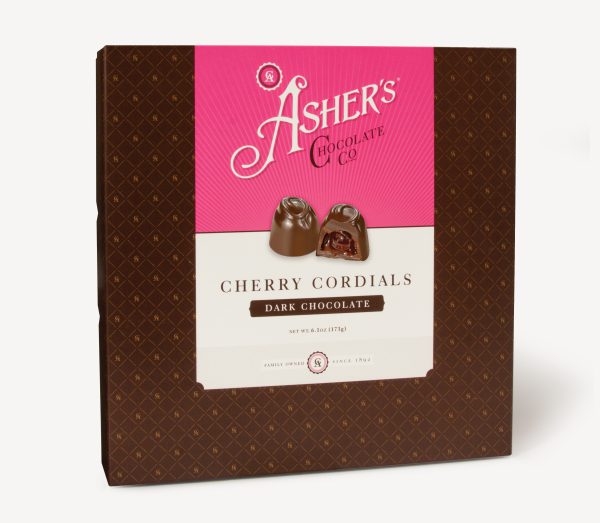 Dark Chocolate Cherry Cordials Traditional Box with pink and white Asher's Chocolate Co. Label. Two (2) cordials on the front of the box reveal, color, size, shape, and texture of candies. Displayed on white background.